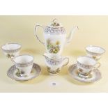 A Sutherland coffee service 'Woodland Dell' comprising: twelve cups and saucers, two coffee pots (