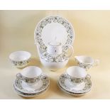 A Wedgwood Perugia teaset comprising: six cups, saucers, side plates, sandwich plate, teapot, milk