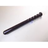 A rosewood Police truncheon