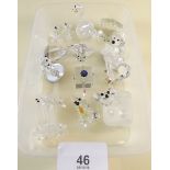 A collection of twelve Swarkovski crystal ornaments