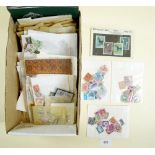 Stamps - a box of all world stamps mint and used in packets, booklets and presentation packs