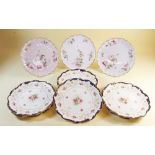 A set of six Edwardian Coalport dessert plates with rose design, together with three Copeland