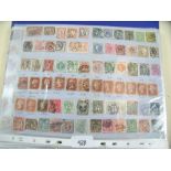 Stamps - two blue folders of GB and all world album cut-outs and approval pages mostly from QV to