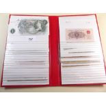 A book of bank notes, mostly British
