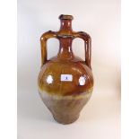 A 19th century continental glazed stoneware two handled jar - 42cm