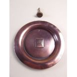 An antique brass seal the carved stone intaglio with farmer sowing seed, and a copper dish made from