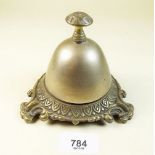 A brass table bell