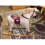 A small corded rocking horse