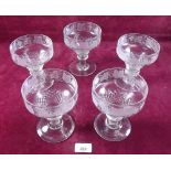 A set of five Victorian large glass sundae dishes with diamond cut decoration and engraved vine