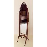 An early 20th century walnut framed cheval mirror