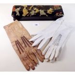An oriental lacquer glove box and contents of three pairs of Edwardian gloves