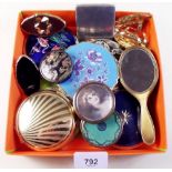 A group of assorted compacts including Stratton