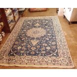 A cream and blue Persian style rug 290 x 197cm