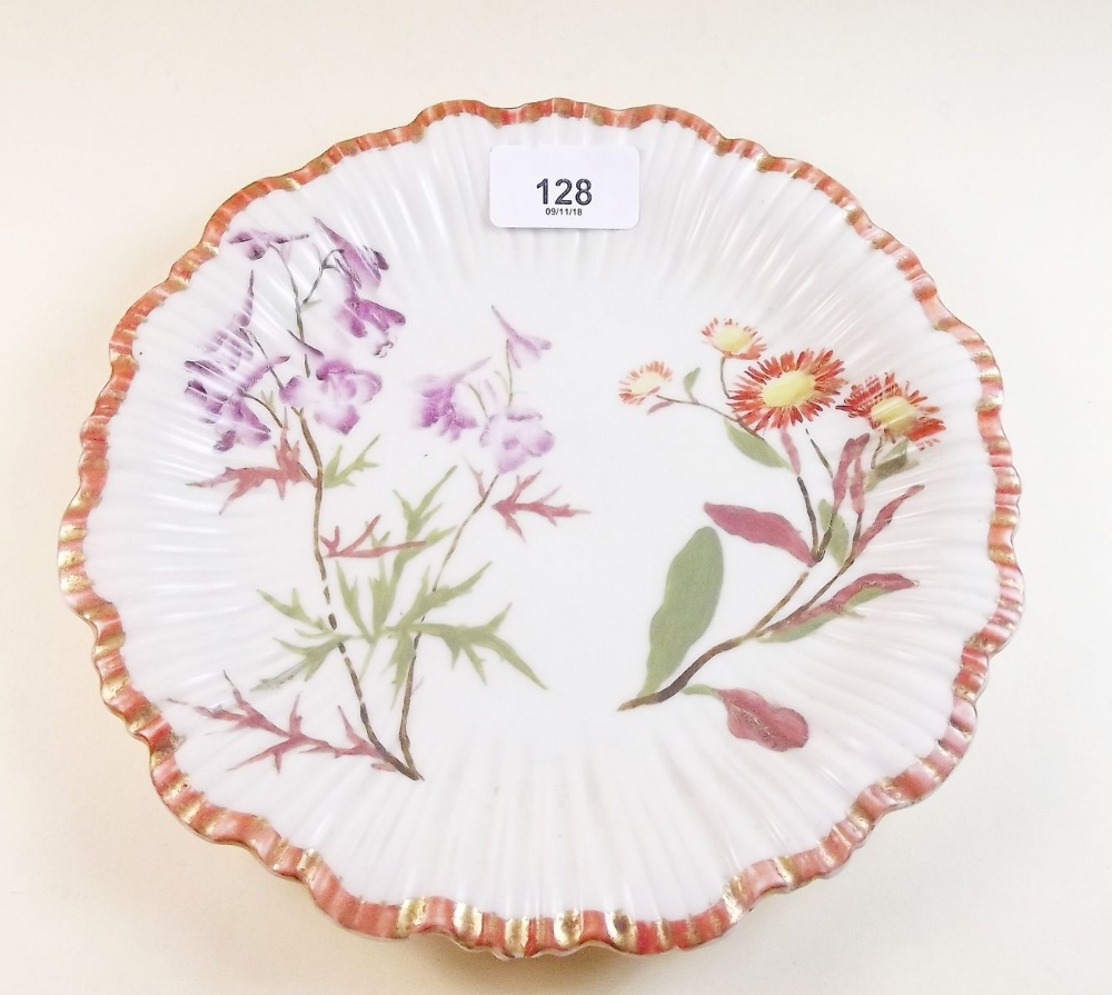 A Royal Worcester floral painted plate on ivory ground