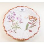 A Royal Worcester floral painted plate on ivory ground