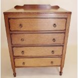 An oak 1930's chest of four drawers