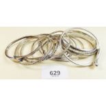 A good selection of silver bangles - total 130g