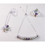 A silver necklace, ring and bracelet set multi gem stones