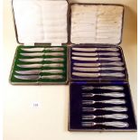A set of six silver handled tea knives, Sheffield 1917 and a set of six Edwardian dessert forks