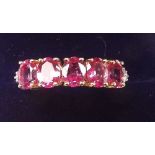 A 9 carat gold ring set pink topaz - size 0