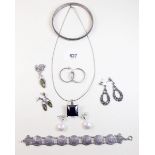 A group of silver jewellery to include pearl earrings and marcasite
