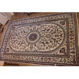 A cream and blue Persian style rug 301 x 195cm