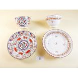 Two decorative tea bowls and saucers circa 1800