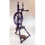 A 19th century turned wood Doughty spinning wheel