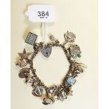 A silver charm bracelet - total weight 46g