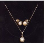 A 9 carat gold and pearl set necklace and earrings set