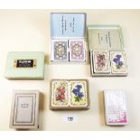 Five sets of boxed playing cards