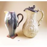A Majolica fish jug (chipped) and a Victorian stoneware press moulded jug