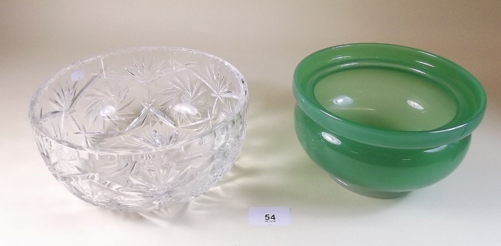 A cut glass bowl and a green glass bowl with pontil mark