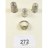 Two Charles Horner silver thimbles and another silver thimble and an 835 Standard silver ring