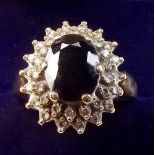 A 9 carat gold sapphire and diamond cluster ring - 47g - size N 1/2