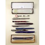 Six various inkpens, biro, two pencils and slide rule