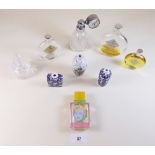 Three Chinese porcelain scent bottles and six glass ones