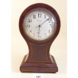 A Liberty and Co Edwardian mahogany cased balloon mantel clock