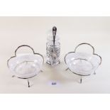 A pair of gilded glass bon bon dishes in silver plated stands and a silver plated and cut glass