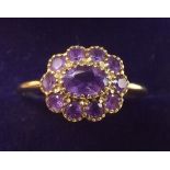 A 9 carat gold and amethyst cluster ring - size P