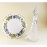 A cut glass decanter and a Royal Worcester cake plate 'Vine Harvest'