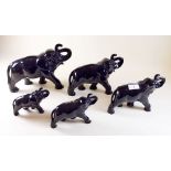 A set of five black Sylvac graduated elephants