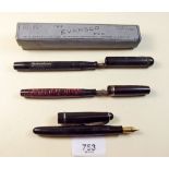 An Evansco ink pen, Osmiroid 65 and a small Vacumatic ink pen