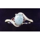 A silver Larimar crossover ring - size E