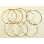 A set of eight various 9 carat gold bangles 36g