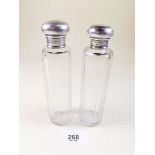 Two silver and cut glass toiletry bottles, London 1898
