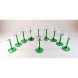 A set of ten green stemmed hock glasses