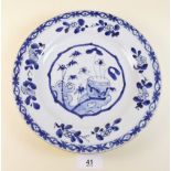 An 18th century Chinese blue and white plate decorated flowers