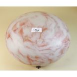 A 1930's pink marbled glass light shade