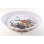 A Portmeirion oval serving dish decorated pheasant
